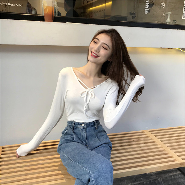 Lezser női blúz V-nyakkal több színben megkötős