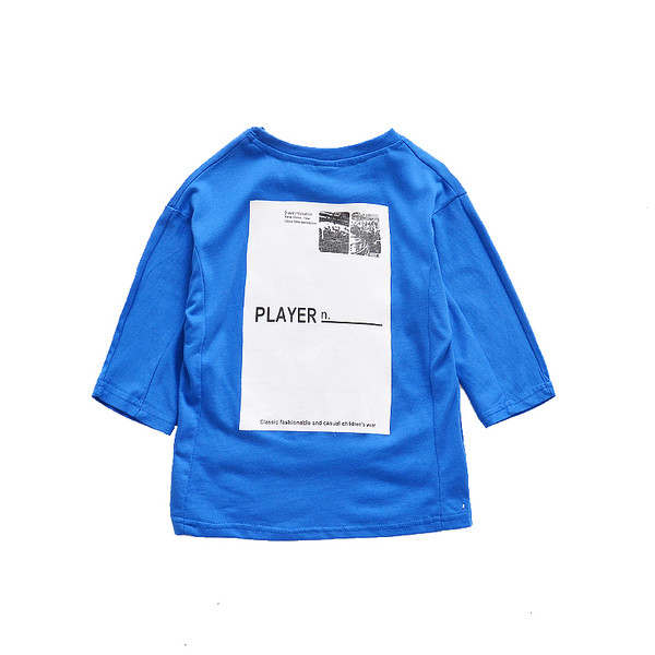 Alkalmi gyerekblúz aszimmetrikus modell három színben és nyomtatásban