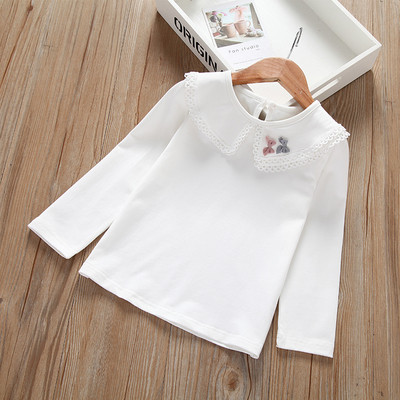 Friss gyerekblúz lányoknak fehér színben, hímzéssel és hosszú ujjal