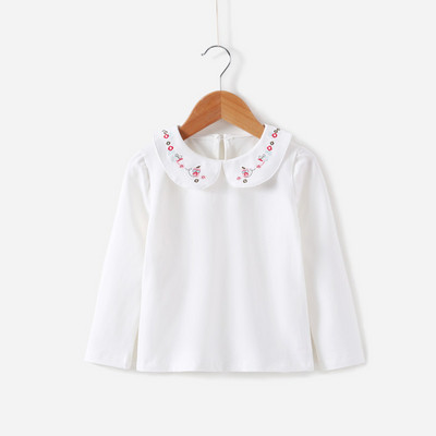 Friss gyerekblúz lányoknak fehér színben, hímzéssel és hosszú ujjal