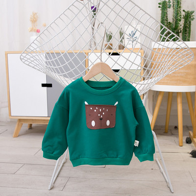 Gyerek blúz fiúknak fehér és zöld színben emblémával