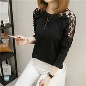 Stílusos női blúz fehér és fekete hímzéssel