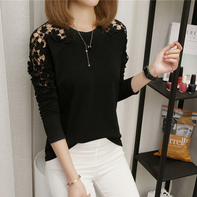 Stílusos női blúz fehér és fekete hímzéssel