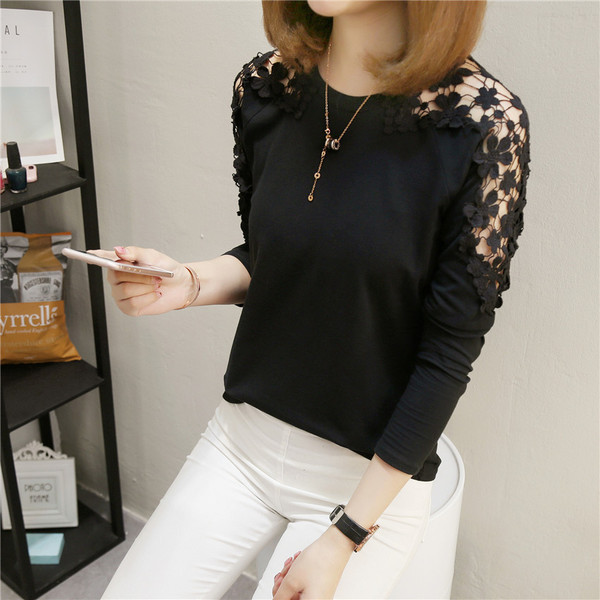 Stílusos női blúz fehér és fekete hímzéssel