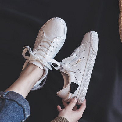 Ανδρικά πάνινα παπούτσια ανοιξιάτικα σε λευκό χρώμα με επίπεδη σόλα