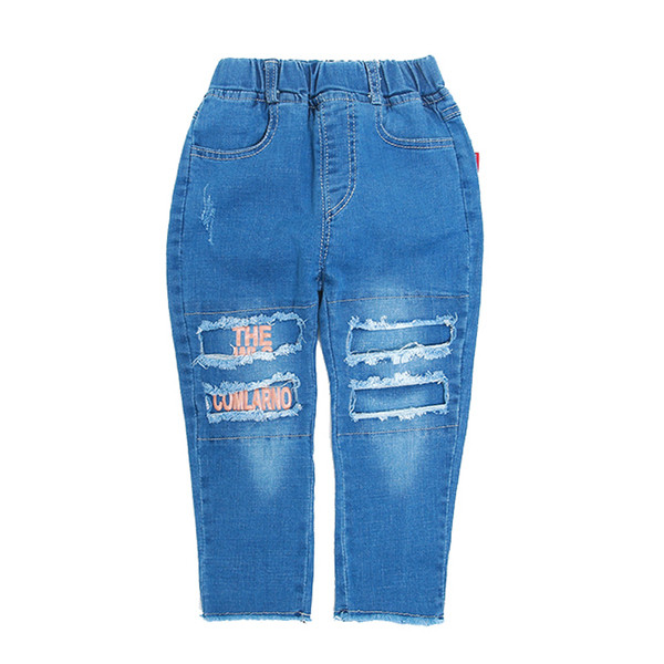 Modern gyerekfarmer fiúknak kék színben, zsebekkel, szakadt motívumokkal