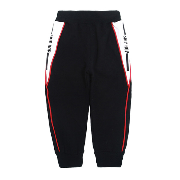 Gyermek sportnadrág fiúknak fekete színben, színes szegéllyel