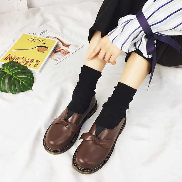 Női alkalmi cipő fekete és barna műbőr színben