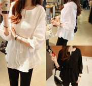 Modern női blúz fekete-fehér nyakkendővel