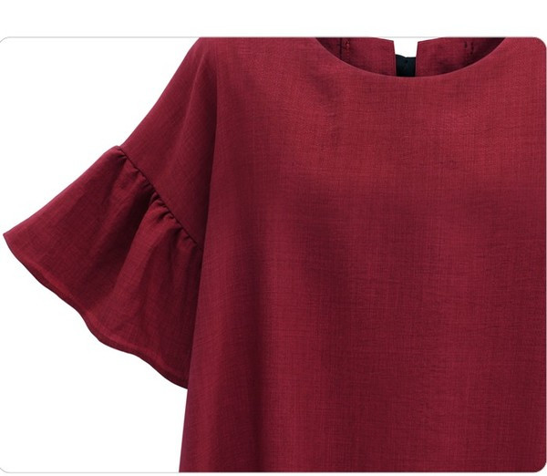 Stílusos női aszimmetrikus blúz, hátul szalaggal