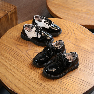Casual children`s shoes for girls made of black leather in black color