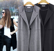 Elegáns női hosszú mellény dekoratív zsebekkel