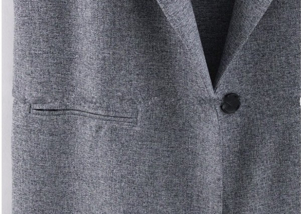 Elegáns női hosszú mellény dekoratív zsebekkel