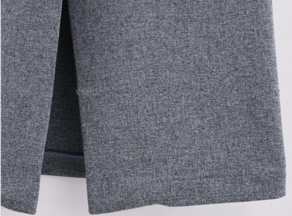 Elegáns női hosszú mellény dekoratív zsebekkel