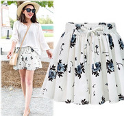 Alkalmi női szoknya fehér virágos motívumokkal