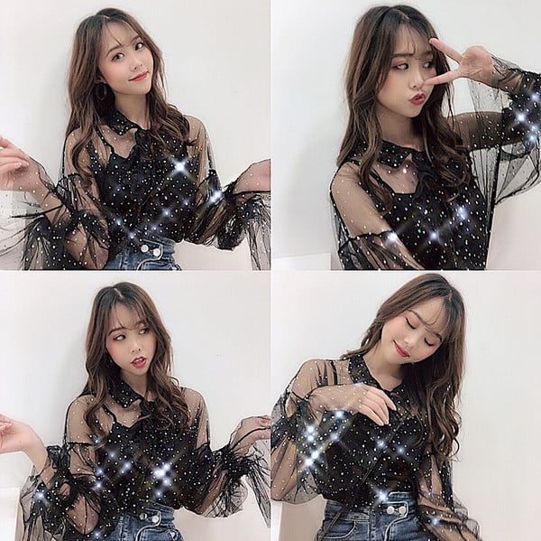 Egy éteri női ing krém-fekete szalaggal