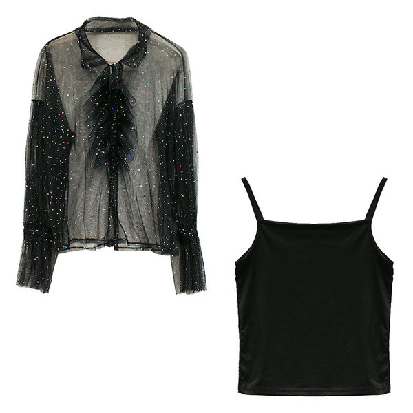 Egy éteri női ing krém-fekete szalaggal