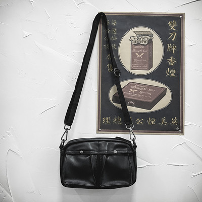 Eko bőrből készült, alkalmi férfi táska fekete színben, több zsebbel