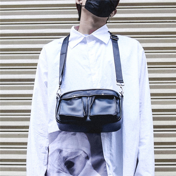 Eko bőrből készült, alkalmi férfi táska fekete színben, több zsebbel