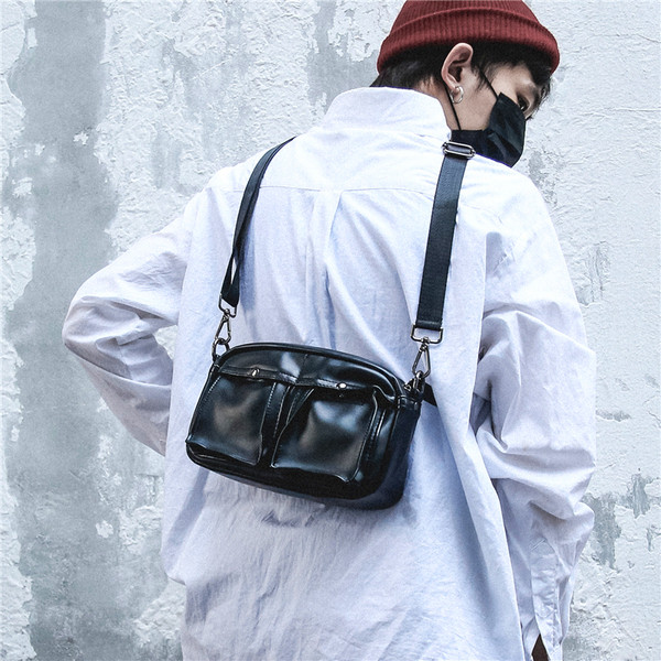 Eko bőrből készült, alkalmi férfi táska fekete színben, több zsebbel