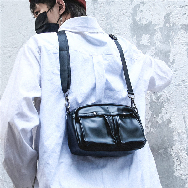 Eko bőrből készült, alkalmi férfi táska fekete színben, több zsebbel