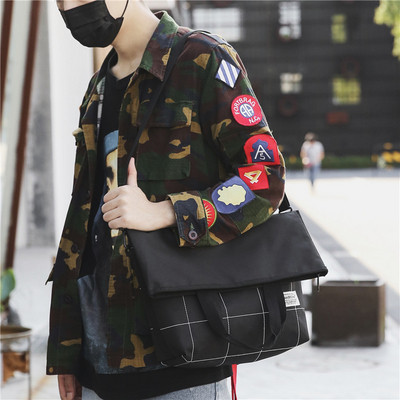 Modern men`s bag in several colors with adjustable strap