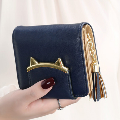 Női kis pénztárca bojt kiegészítővel több színben