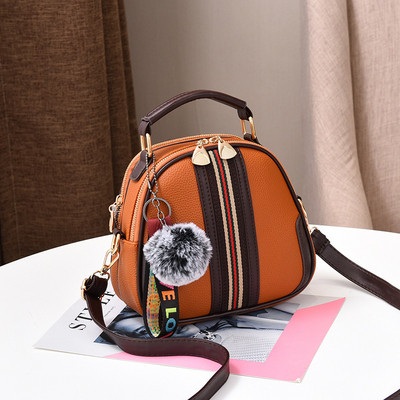 Modern női táska több színben, műbőr pehellyel