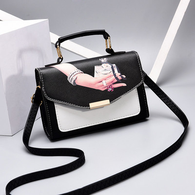 Modern női táska fém fogantyúval, öko bőrből