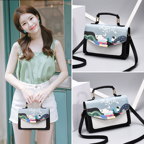 Modern női táska fém fogantyúval, öko bőrből