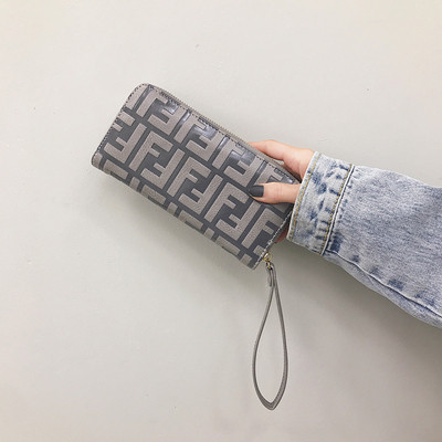 Modern női pénztárca cipzárral és rövid fogantyúval