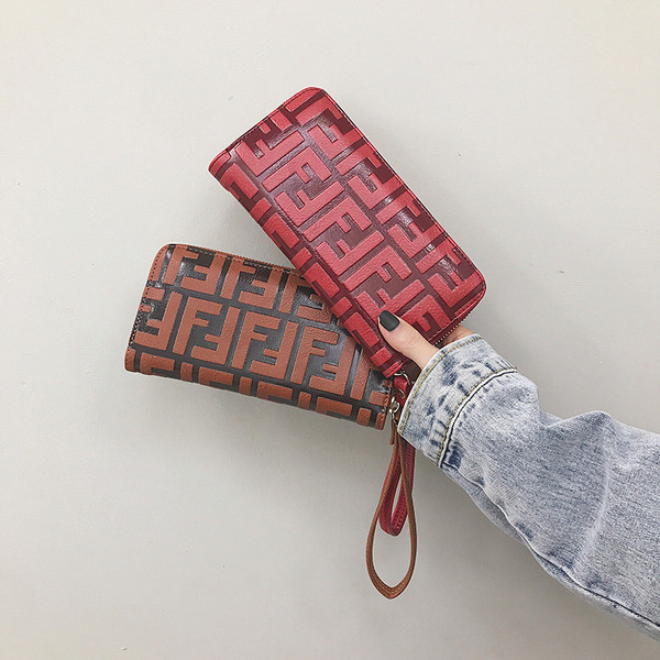 Modern női pénztárca cipzárral és rövid fogantyúval