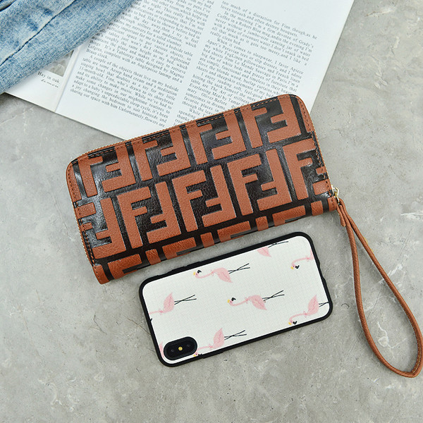 Modern női pénztárca cipzárral és rövid fogantyúval