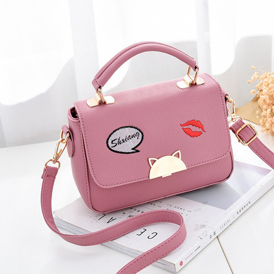 Geanta de dama eleganta cu broderie si element metalic