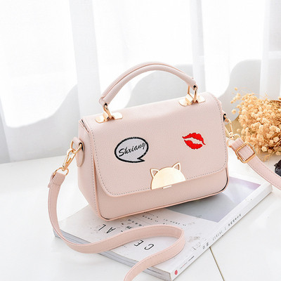 Geanta de dama eleganta cu broderie si element metalic