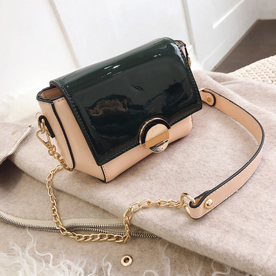 Modern női táska fém rögzítéssel, különböző színekben