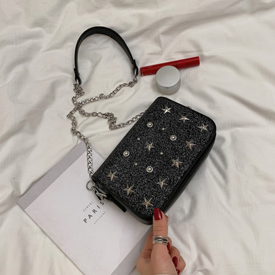 Modern női táska fém elemekkel és fém fogantyúval több színben