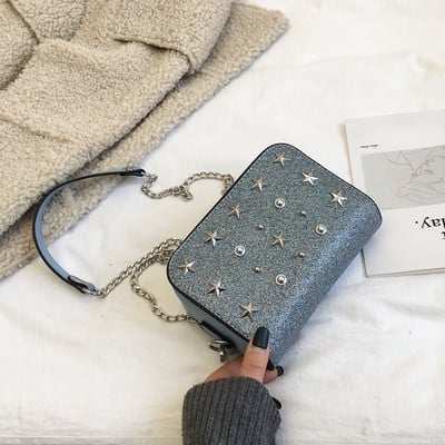 Modern női táska fém elemekkel és fém fogantyúval több színben