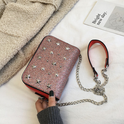 Modern női táska fém elemekkel és fém fogantyúval több színben