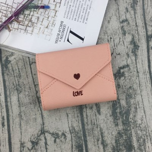 Κομψό γυναικείο μίνι πορτοφόλι με κεντήματα