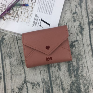 Κομψό γυναικείο μίνι πορτοφόλι με κεντήματα