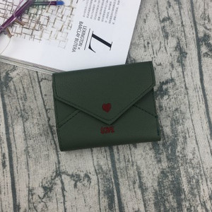 Κομψό γυναικείο μίνι πορτοφόλι με κεντήματα