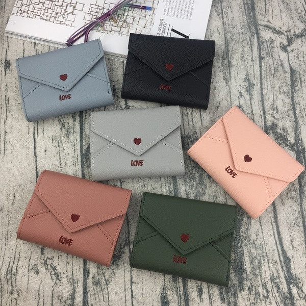 Κομψό γυναικείο μίνι πορτοφόλι με κεντήματα