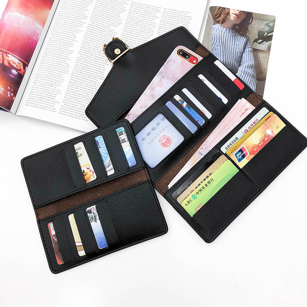 Stílusos női pénztárca fém elemmel