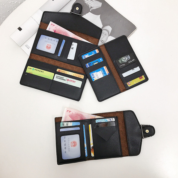 Stílusos női pénztárca fém díszítéssel fekete színben - két méretben