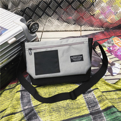 Modern férfi táska hosszú pánttal, négy színben