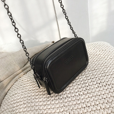 Modern kis női táska eko bőrből, fém fogantyúval