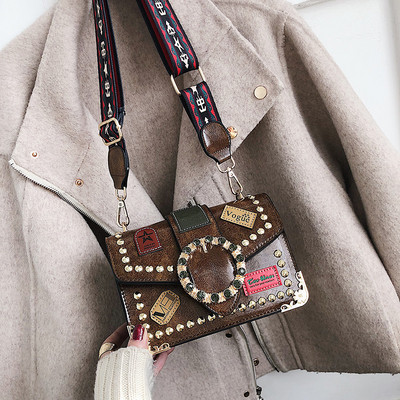 Új modell eko bőrből készült női táska több színben, fém elemmel