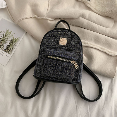 Modern női hátizsák több színben, fém díszítéssel