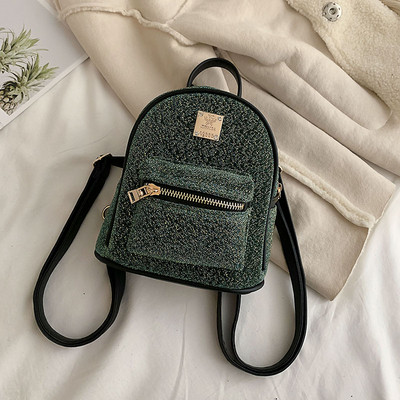 Modern női hátizsák több színben, fém díszítéssel